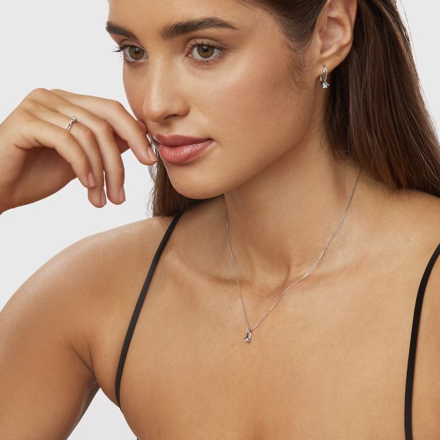 WHITE GOLD DIAMOND RIBBON PENDANT - PENDANTS - 